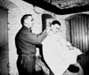 2. Major Siemers cuts hair of Shorty Walsh Division barber