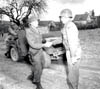 31. Col. Howard (DIVARTY) shakes hands with Gen Dager.