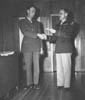 541. General Kilburn shakes hands with Pvt. Mayberry.
