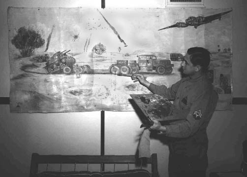 641. T-5 Ferro at work on wall mural.